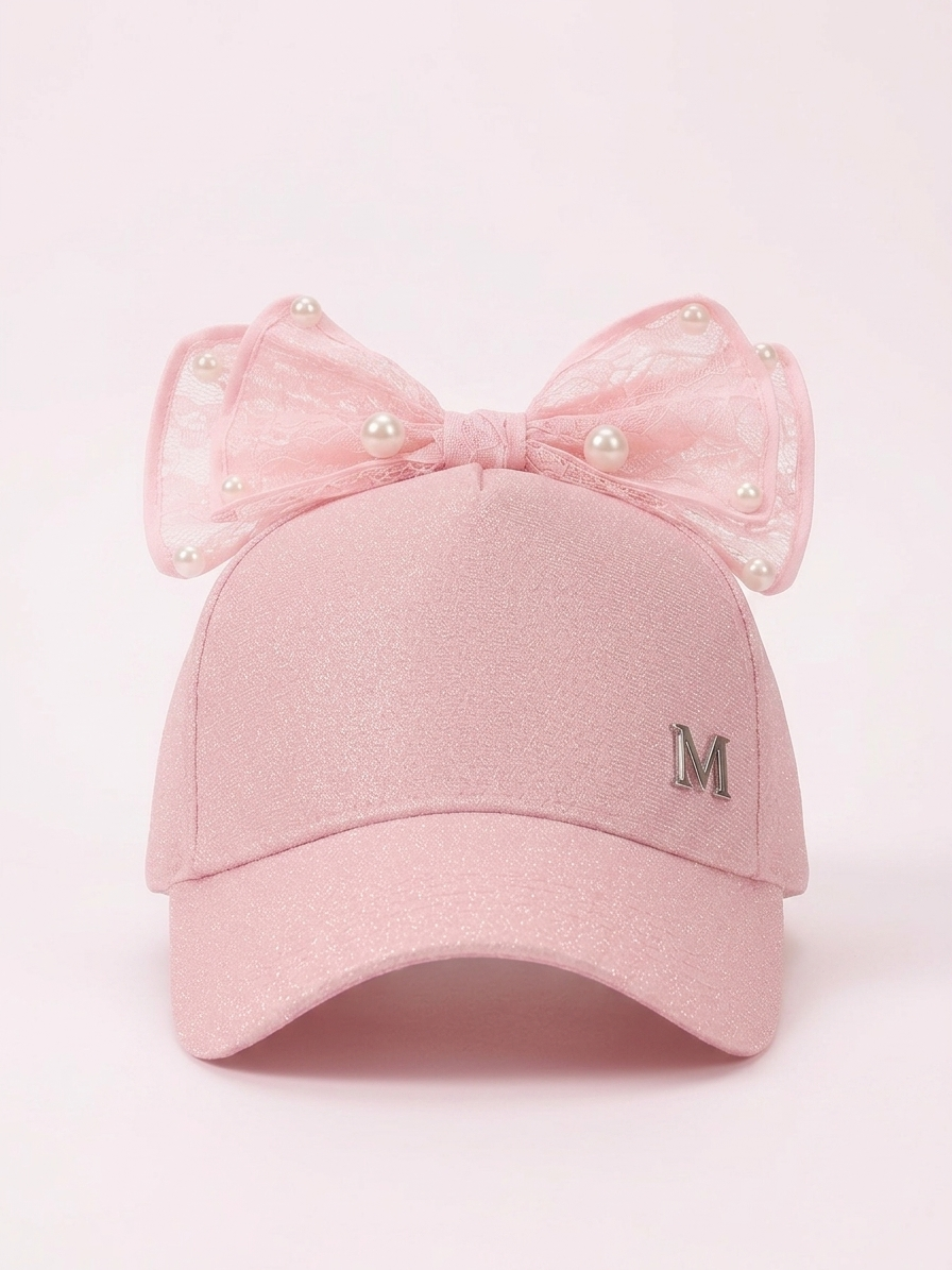 Kids pink glitter cap with large lace bow and pearl beads, front M patch